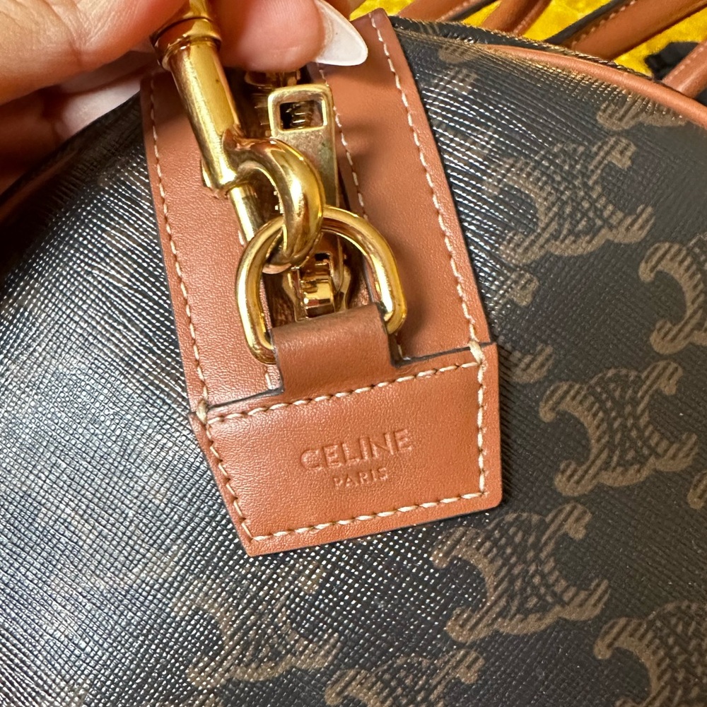 MEDIUM TRAVEL BAG IN TRIOMPHE CANVAS AND CALFSKIN - Picture 10 of 16